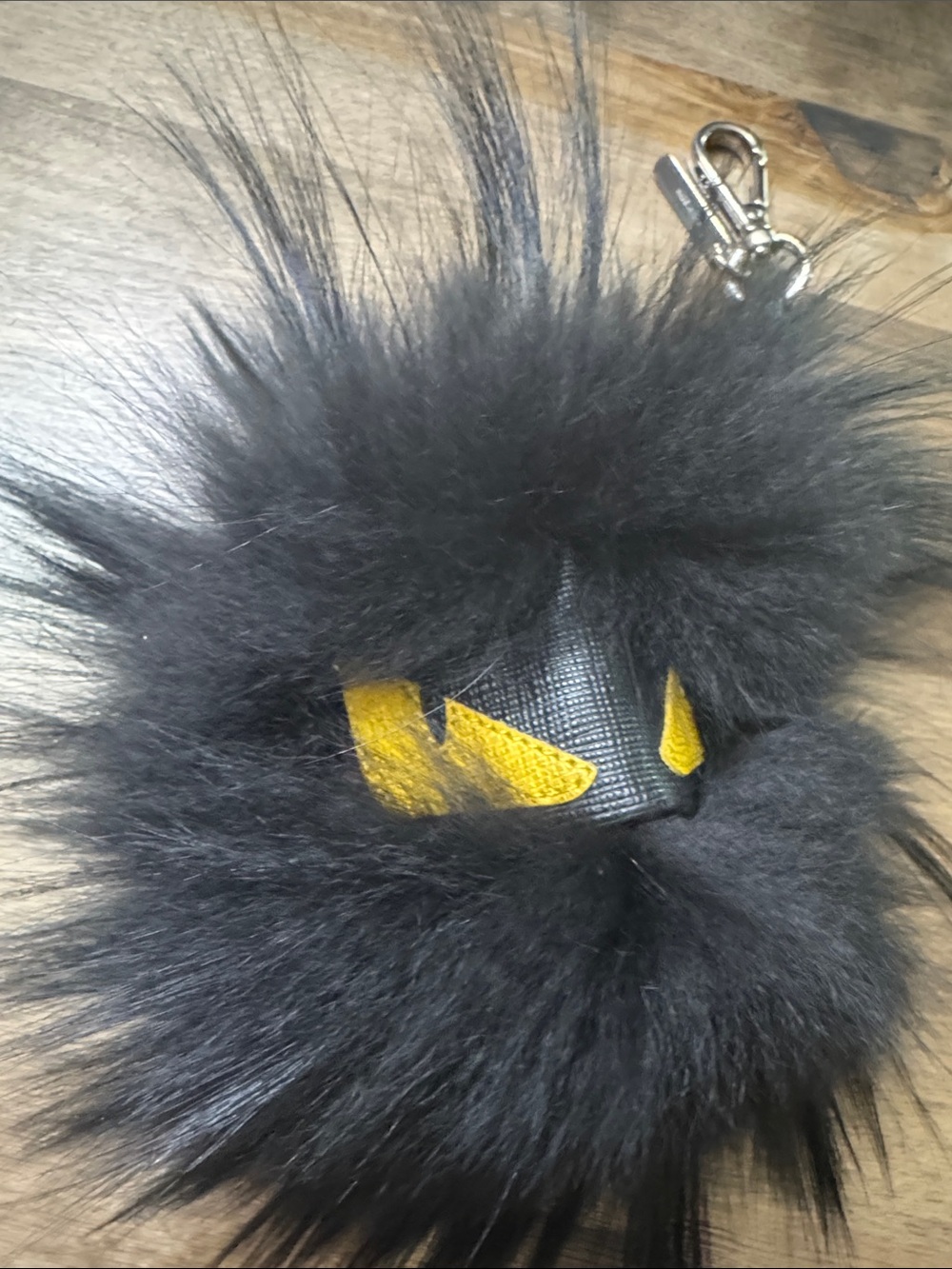 AUTHENTIC Black Fur Monster Keychain with Yellow Eye Detail